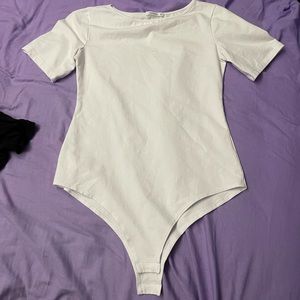 Women’s white body suit